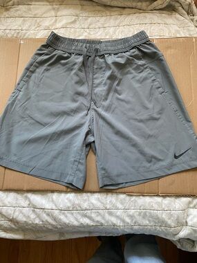 Nike Men's Light Gray Athletic Shorts with Swoosh